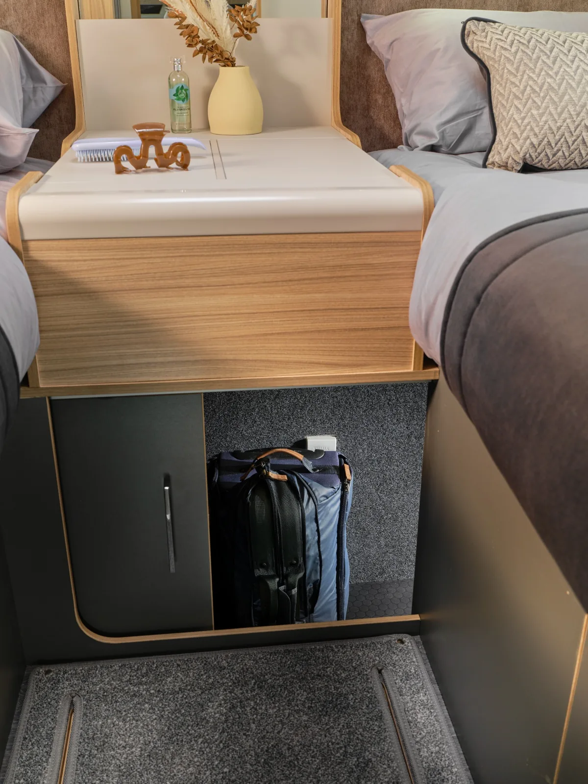 2027 Bailey Adamo 75-4T internal access to rear garage storage beneath twin beds