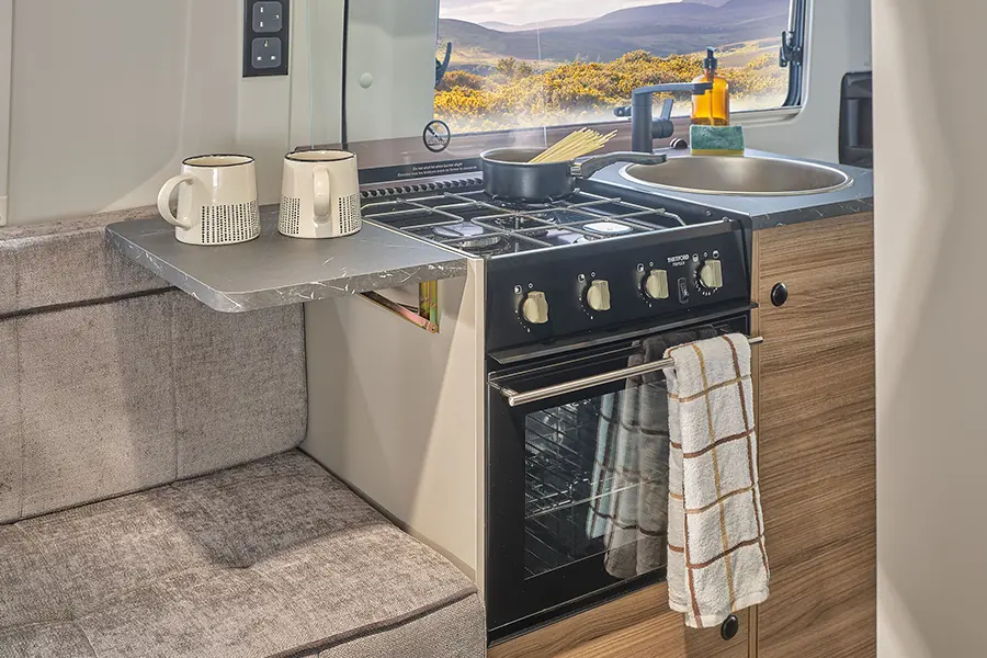 Bailey Endeavour B62 campervan kitchen with hob oven and sink