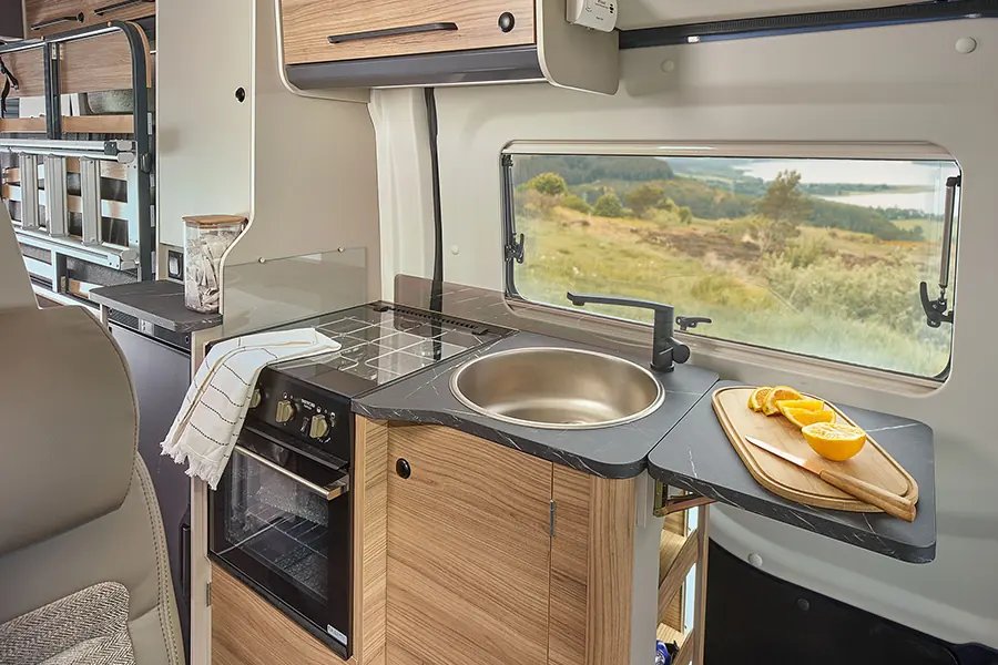 Bailey Endeavour B65 campervan kitchen with hob oven and sink