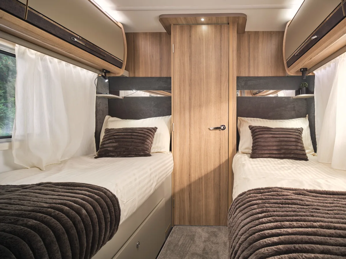 Storage beneath the fixed single beds in the Bailey Unicorn Deluxe Cadiz