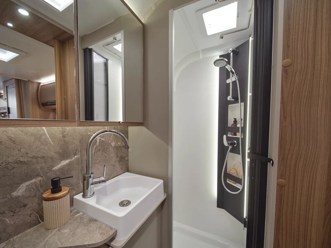 Rear washroom vanity basin and mirror in the Bailey Unicorn Deluxe Cadiz