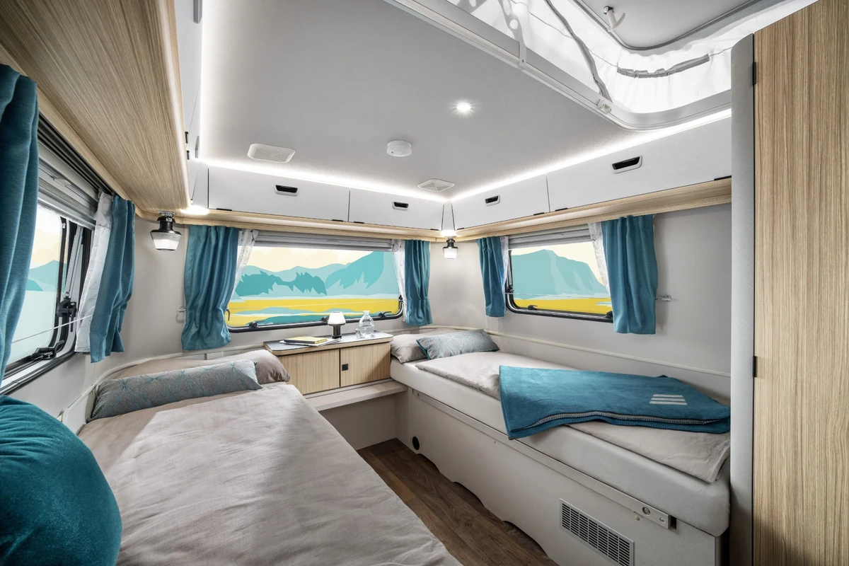 Two separate single beds inside the ERIBA Touring 620