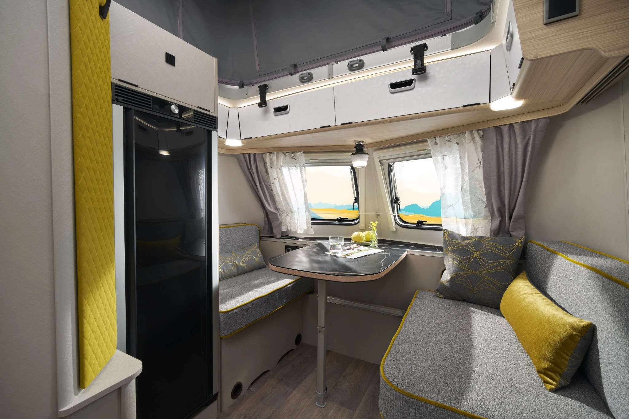 Front lounge and dining area in the ERIBA Touring 642
